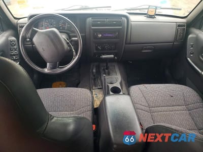 Zdjęcie 8 z 13 samochodu: 2001 JEEP CHEROKEE VIN:1J4FF48S11L570718 - miniatura