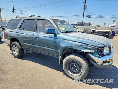 Czwarte zdjęcie samochodu z boku: 1997 TOYOTA 4RUNNER SR5 VIN:JT3GN86R1V0050597 - miniatura
