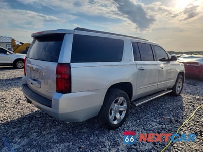 Trzecie zdjęcie samochodu z tyłu: 2018 CHEVROLET SUBURBAN K1500 LT VIN:1GNSKHKC3JR151993 - miniatura