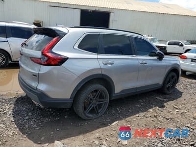Trzecie zdjęcie samochodu z tyłu: 2023 HONDA CR-V SPORT TOURING VIN:2HKRS6H98PH807371 - miniatura