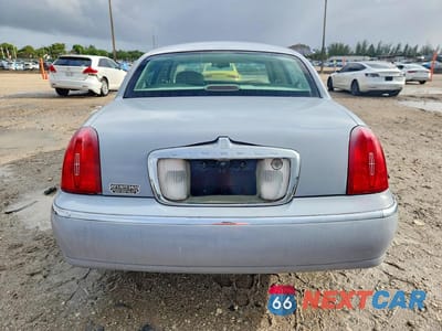 Zdjęcie 6 z 13 samochodu: 1999 LINCOLN TOWN CAR SIGNATURE VIN:1LNHM82W3XY683830 - miniatura