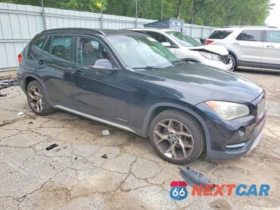 Czwarte zdjęcie samochodu z boku: 2013 BMW X1 SDRIVE28I VIN:WBAVM1C57DVL64316 - miniatura