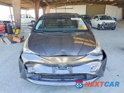 Piąte zdjęcie samochodu w środku: 2016 TOYOTA PRIUS TWO VIN:JTDKBRFU4G3010864 - miniatura