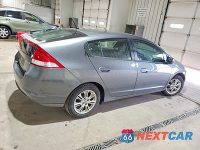 Trzecie zdjęcie samochodu z tyłu: 2010 HONDA INSIGHT EX VIN:JHMZE2H78AS004520 - miniatura