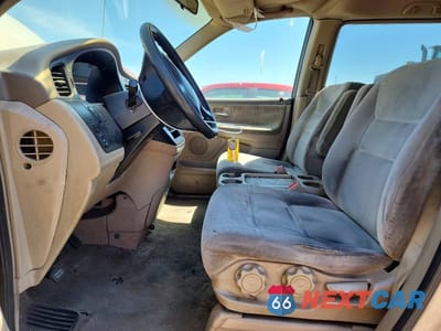 Zdjęcie 7 z 13 samochodu: 2002 HONDA ODYSSEY LX VIN:2HKRL18502H508110 - miniatura