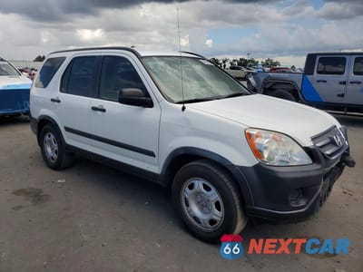Czwarte zdjęcie samochodu z boku: 2006 HONDA CR-V LX VIN:JHLRD68596C002113 - miniatura