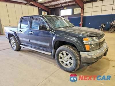 Czwarte zdjęcie samochodu z boku: 2012 CHEVROLET COLORADO LT VIN:1GCHTDFEXC8114565 - miniatura