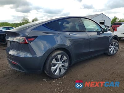 Trzecie zdjęcie samochodu z tyłu: 2023 TESLA MODEL Y VIN:7SAYGDEE3PF843165 - miniatura