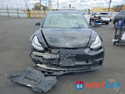 Piąte zdjęcie samochodu w środku: 2018 TESLA MODEL 3 VIN:5YJ3E1EA8JF178022 - miniatura