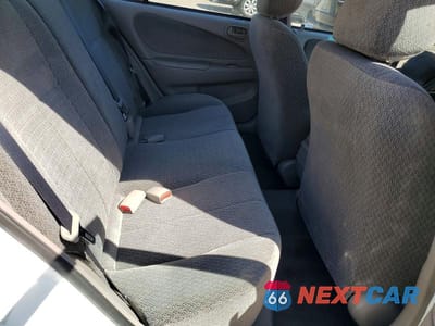 Zdjęcie 10 z 13 samochodu: 2002 TOYOTA COROLLA LE VIN:1NXBR12E32Z643205 - miniatura