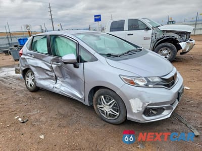 Czwarte zdjęcie samochodu z boku: 2019 HONDA FIT EX VIN:3HGGK5H8XKM753309 - miniatura