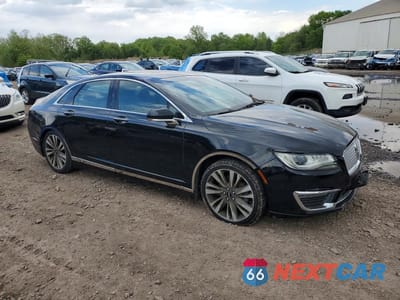 Czwarte zdjęcie samochodu z boku: 2017 LINCOLN MKZ RESERVE VIN:3LN6L5F97HR605418 - miniatura