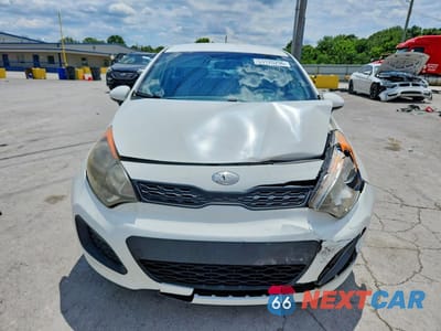 Piąte zdjęcie samochodu w środku: 2013 KIA RIO LX VIN:KNADM5A39D6307713 - miniatura