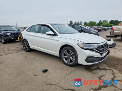 Czwarte zdjęcie samochodu z boku: 2022 VOLKSWAGEN JETTA SE VIN:3VW7M7BU9NM031485 - miniatura