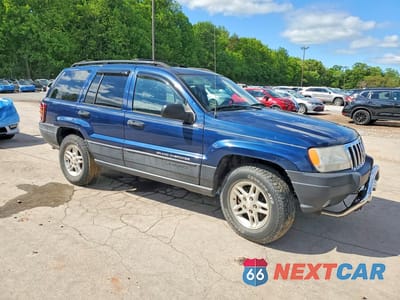 Czwarte zdjęcie samochodu z boku: 2003 JEEP GRAND CHEROKEE LAREDO VIN:1J4GW48S53C570261 - miniatura