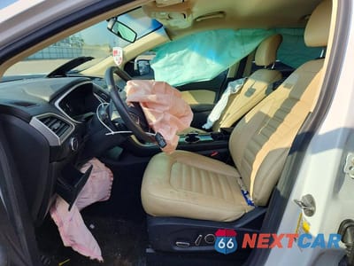Zdjęcie 7 z 13 samochodu: 2015 FORD EDGE SEL VIN:2FMTK3J86FBB37606 - miniatura