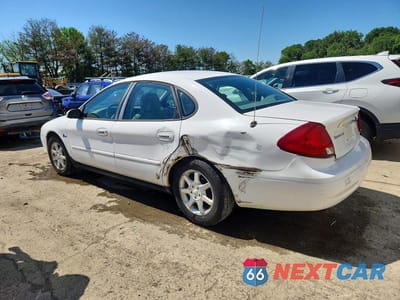 Drugie zdjęcie samochodu z przodu: 2000 FORD TAURUS SES VIN:1FAFP5528YG140741 - miniatura