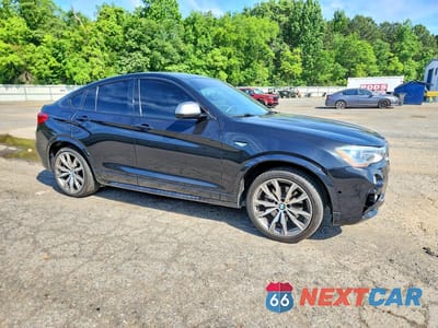 Czwarte zdjęcie samochodu z boku: 2018 BMW X4 XDRIVEM40I VIN:5UXXW7C52J0W63759 - miniatura