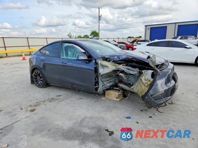 Czwarte zdjęcie samochodu z boku: 2023 TESLA MODEL Y VIN:7SAYGDEF7PF874976 - miniatura