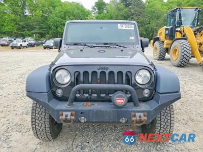 Piąte zdjęcie samochodu w środku: 2014 JEEP WRANGLER UNLIMITED SPORT VIN:1C4BJWDGXEL267801 - miniatura