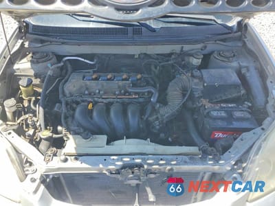 Zdjęcie 11 z 13 samochodu: 2003 TOYOTA COROLLA MATRIX XR VIN:2T1KR32E03C043367 - miniatura