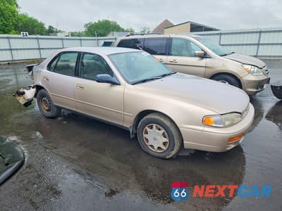 Czwarte zdjęcie samochodu z boku: 1996 TOYOTA CAMRY DX VIN:4T1BG12K7TU731199 - miniatura