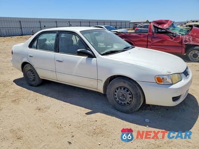 Czwarte zdjęcie samochodu z boku: 2001 TOYOTA COROLLA LE VIN:1NXBR12E41Z563734 - miniatura