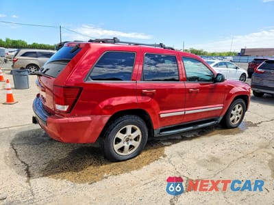 Trzecie zdjęcie samochodu z tyłu: 2010 JEEP GRAND CHEROKEE LAREDO VIN:1J4PR4GK8AC107634 - miniatura