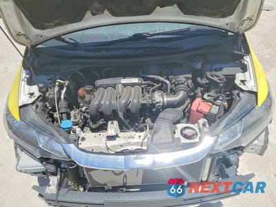 Zdjęcie 12 z 14 samochodu: 2019 HONDA FIT LX VIN:3HGGK5H49KM702848 - miniatura