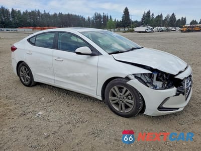 Czwarte zdjęcie samochodu z boku: 2018 HYUNDAI ELANTRA VALUE EDITION VIN:5NPD84LFXJH315636 - miniatura