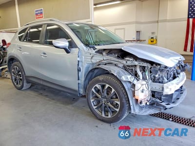 Czwarte zdjęcie samochodu z boku: 2016 MAZDA CX-5 GT VIN:JM3KE2DY4G0668942 - miniatura