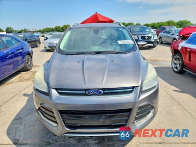 Piąte zdjęcie samochodu w środku: 2014 FORD ESCAPE TITANIUM VIN:1FMCU0JX2EUB44576 - miniatura