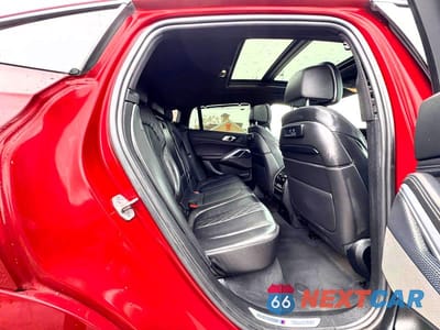 Zdjęcie 6 z 10 samochodu: 2021 BMW X6 M50I VIN:5UXCY8C09M9E51267 - miniatura