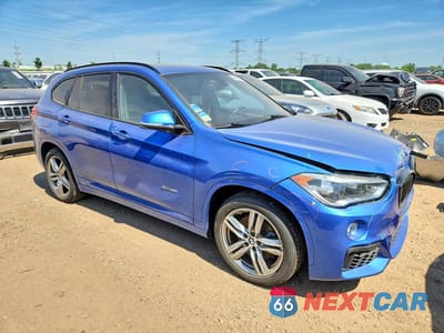 Czwarte zdjęcie samochodu z boku: 2016 BMW X1 XDRIVE28I VIN:WBXHT3C35G5F66059 - miniatura