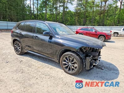 Czwarte zdjęcie samochodu z boku: 2022 BMW X5 XDRIVE40I VIN:5UXCR6C04N9L77630 - miniatura