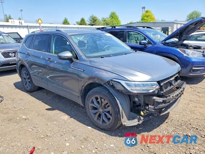 Czwarte zdjęcie samochodu z boku: 2022 VOLKSWAGEN TIGUAN SE VIN:3VV2B7AX1NM067297 - miniatura