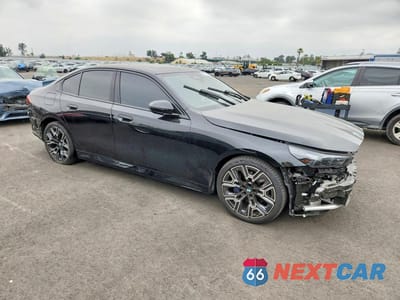 Czwarte zdjęcie samochodu z boku: 2026 BMW 530I VIN:WBA43FJ09TCV35631 - miniatura