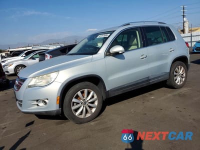 2011 VOLKSWAGEN TIGUAN S WVGAV7AX0BW503002 - główne zdjęcie licytacji z USA - miniatura