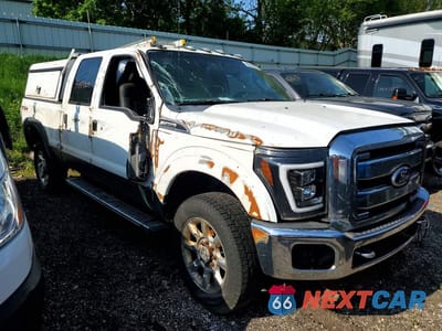 Czwarte zdjęcie samochodu z boku: 2011 FORD F350 SUPER DUTY VIN:1FT8W3BT3BEA55297 - miniatura