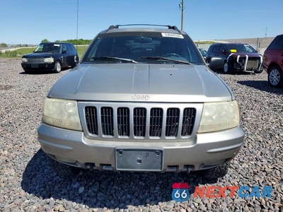 Piąte zdjęcie samochodu w środku: 1999 JEEP GRAND CHEROKEE LIMITED VIN:1J4GW68N5XC638750 - miniatura