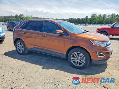 Czwarte zdjęcie samochodu z boku: 2017 FORD EDGE SEL VIN:2FMPK4J99HBC59962 - miniatura