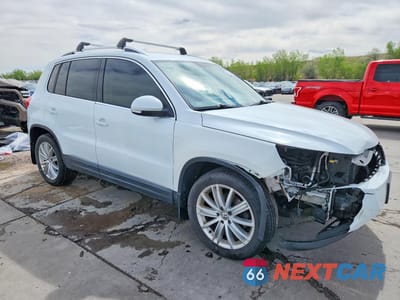 Czwarte zdjęcie samochodu z boku: 2014 VOLKSWAGEN TIGUAN S VIN:WVGBV3AX1EW624137 - miniatura