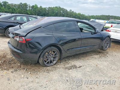Trzecie zdjęcie samochodu z tyłu: 2018 TESLA MODEL 3 VIN:5YJ3E1EA5JF033035 - miniatura