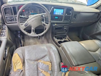 Zdjęcie 8 z 13 samochodu: 2006 GMC YUKON DENALI VIN:1GKEK63U86J154741 - miniatura