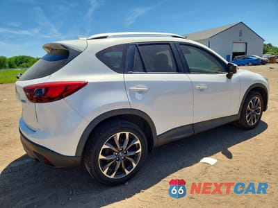 Trzecie zdjęcie samochodu z tyłu: 2016 MAZDA CX-5 GT VIN:JM3KE4DY2G0878788 - miniatura