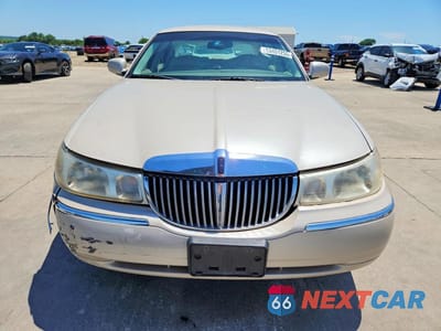 Piąte zdjęcie samochodu w środku: 2000 LINCOLN TOWN CAR CARTIER VIN:1LNHM83W6YY877221 - miniatura