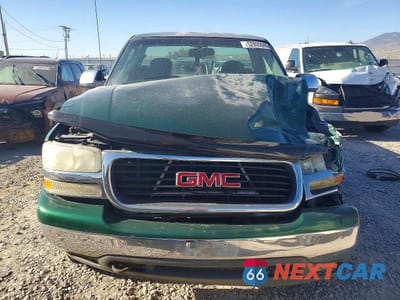 Piąte zdjęcie samochodu w środku: 1999 GMC NEW SIERRA K1500 VIN:1GTEK14T4XZ517799 - miniatura