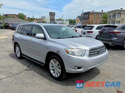 Czwarte zdjęcie samochodu z boku: 2010 TOYOTA HIGHLANDER HYBRID LIMITED VIN:JTEJW3EH5A2043009 - miniatura
