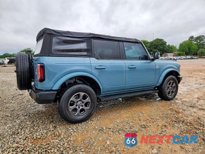 Trzecie zdjęcie samochodu z tyłu: 2022 FORD BRONCO BASE VIN:1FMEE5BP1NLB49162 - miniatura