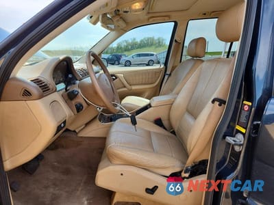 Zdjęcie 7 z 14 samochodu: 2003 MERCEDES-BENZ ML 320 VIN:4JGAB54E83A372178 - miniatura